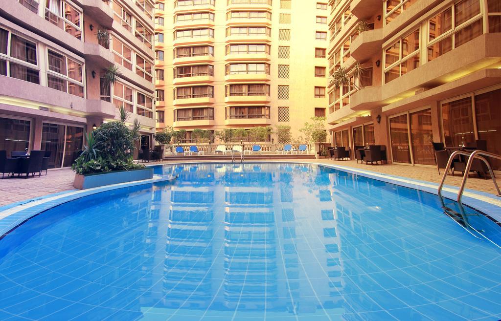 Pyramisa Downtown Residence Hotel Cairo Giza Exterior photo